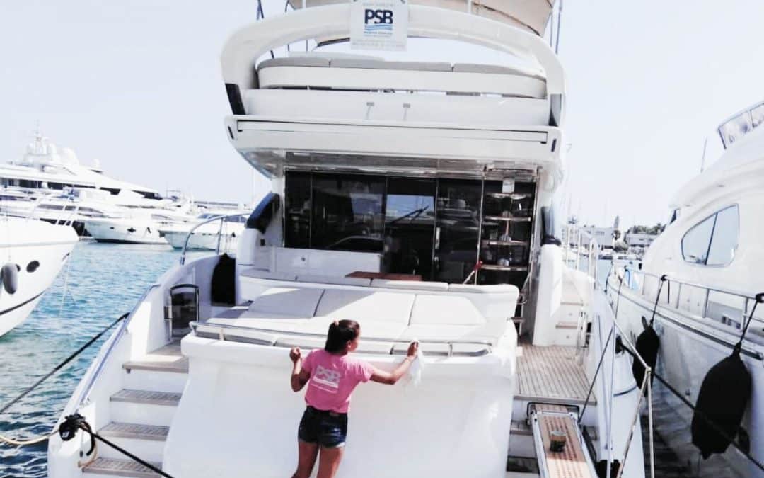 women cleaing a luxury yacht